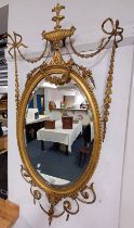 GILT FRAMED OVAL WALL MIRROR,