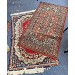 TWO MIDDLE EASTERN RUGS,