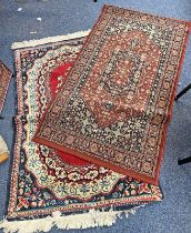 TWO MIDDLE EASTERN RUGS,