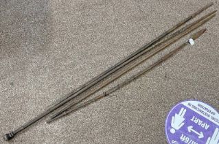 FOUR SPEARS WITH METAL ENDS ON WOOD SHAFTS,