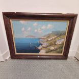 FRAMED OIL PAINTING OF A COASTAL VILLAGE SCENE SIGNED STAYIMO 60 CM X 90 CM