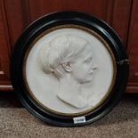 CIRCULAR FRAMED ALABASTER PORTRAIT OF A LADY,