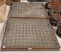 TWO LARGE WOODEN TRAYS OF GLASS COMMUNAL WINE HOLDERS Condition Report: Glasses are