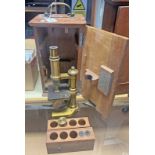 BAIRD & TATLOCK LACQUERED BRASS MICROSCOPE WITH R & J BECK LENS IN ITS CASE WITH LENSES