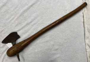 AFRICAN TRIBAL AXE WITH BATTLE DAMAGE TO METAL AXE HEAD ON WOODEN SHAFT,