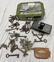 SELECTION OF VINTAGE KEYS IN A HARRODS TIN WITH AN INK BLOTTER