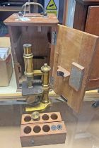 BAIRD & TATLOCK LACQUERED BRASS MICROSCOPE WITH R & J BECK LENS IN ITS CASE WITH LENSES