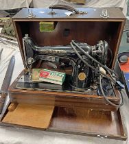 SINGER SEWING MACHINE WITH ELECTRIC MOTOR AND OTHER ACCESSORIES IN CARRY CASE