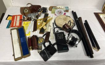 MEASURING EQUIPMENT, HARDWOOD ROLLERS, CARVED TRIBEL STICK, MULTI BAND SCANNER, AA BADGE,