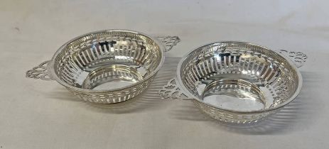 PAIR OF SILVER TWIN HANDLED NUT DISHES WITH PIERCED DECORATION,