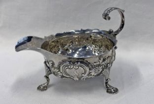 GEORGE II SILVER SAUCE BOAT WITH FOLIATE EMBOSSED DECORATION BY DAVID HENNELL,