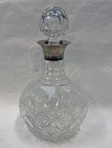 SILVER MOUNTED CUT GLASS DECANTER,
