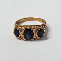 9CT GOLD SAPPHIRE & DIAMOND SCROLL SET RING - 3.