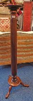 MAHOGANY TORCHERE WITH REEDED COLUMN ON 3 SPREADING SUPPORTS 135 CM TALL