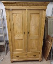 PINE WARDROBE WITH 2 PANEL DOORS OVER A LARGE SINGLE DRAWERS.