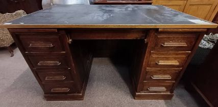 OAK DESK WITH ALTER INSET TOP & 9 DRAWERS.