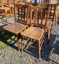 SET OF 4 ELM CHAIRS ON TURNED SUPPORTS.