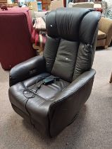 BROWN LEATHER RECLINING CHAIR