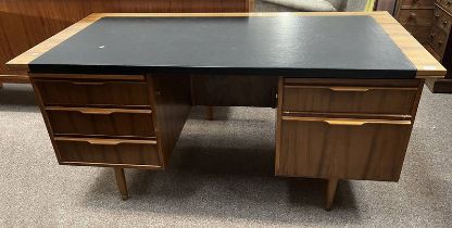 TEAK KNEEHOLE DESK WITH BLACK LEATHERETTE INSET TOP & 5 DRAWERS ON TAPERED SUPPORTS,