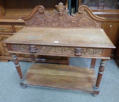 19TH CENTURY CARVED OAK HALL TABLE WITH UNDERSHELF & SINGLE DRAWER WITH MASK HANDLES ON TURNED