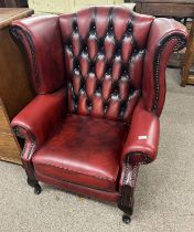 RED LEATHERETTE BUTTONBACK WING BACK ARMCHAIR ON SHORT CABRIOLE SUPPORTS - 105CM TALL