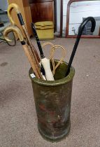 RECONSTITUTED STONE STICK STAND WITH PAINTED DECORATION & CONTENTS OF WALKING STICKS,
