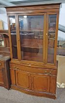 20TH CENTURY MAHOGANY CABINET WITH SINGLE GLAZED PANEL DOOR OVER BASE WITH 1 LONG SHAPED FRONT