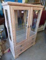 LIMED OAK EFFECT DISPLAY CABINET WITH 2 GLAZED PANEL DOORS OPENING TO GLASS SHELVED INTERIOR OVER 2