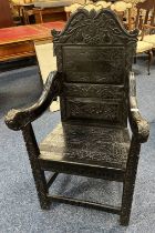 19TH CENTURY EBONISED HALL CHAIR WITH CARVED PANEL BACK & SEAT ON BLOCK SUPPORTS - 90CM TALL