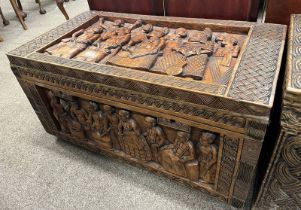 AFRICAN HARDWOOD TRUNK WITH CARVED FIGURE DECORATION,