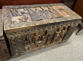 AFRICAN HARDWOOD TRUNK WITH CARVED FIGURE DECORATION,