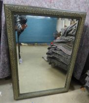 BEVELLED EDGED RECTANGULAR MIRROR WITH DECORATIVE FRAME. INNER DIMENSIONS.