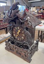 CARVED WOODEN CUCKOO CLOCK WITH DOUBLE FUSEE MOVEMENT, 43CM TALL Condition Report: 5.