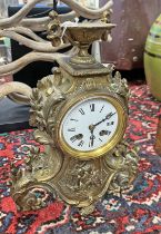 LATE 19TH OR EARLY 20TH CENTURY GILT METAL MANTLE CLOCK WITH WHITE ENAMEL FACE, 34.