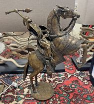 AFRICAN TRIBAL BRONZE SCULPTURE OF A FEMALE WARRIOR ON A HORSE,