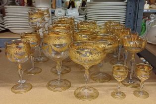 20 GILT RIMMED GLASSES ON HALF SHELF