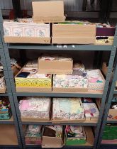 SELECTION OF VARIOUS DOLLS CLOTHES & ACCESSORIES OVER 4 SHELVES
