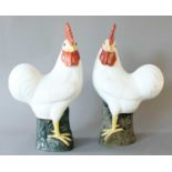 A Pair of Chinese Porcelain Chickens, 20th century, naturalistically modelled and painted, 40cm