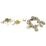 A Chrysoberyl and Garnet Five Stone Ring, unmarked, finger size L1/2; A Coin Bracelet (a.f.); and