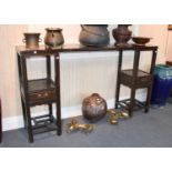 A Chinese Hardwood Altar Table, Late 19th/Early 20th century, in three sections, the associated