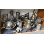 A Collection of Antique Pewter Hollow Wares, mainly measures and coffee pots and a tapered