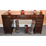 An Early 20th Century Chinese Hardwood Double Pedestal Desk, in three sections with an arrangement