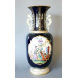 A French Twin-Handled Vase, late 19th century, painted with chinoiserie figures in panels on a