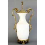 A Gilt Metal Mounted White Porcelain Lamp, late 19th/early 20th century, of baluster form with