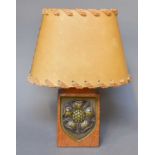 A Yorkshire Oak Table Lamp, of adzed wedge form and with a Yorkshire rose motif, on a sheild plaque,