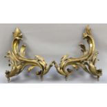 A Pair of 19th Century French Chevrettes, gilt metal and of scroll form (2)