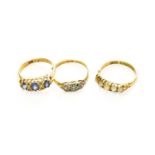An 18 Carat Gold Split Pearl Ring, finger size L1/2; An 18 Carat Gold Sapphire and Diamond Ring,
