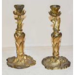 A Pair of Gilt Bronze Candlesticks, of leaf-sheathed and cast form, 28cm high