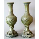 A Pair of French Verdi Gris Vases, of baluster form cast with foliage, on scroll feet and marble