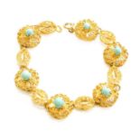 A Turquoise Fancy Link Bracelet, stamped '750', length 19.8cmGross weight 23.3 grams.